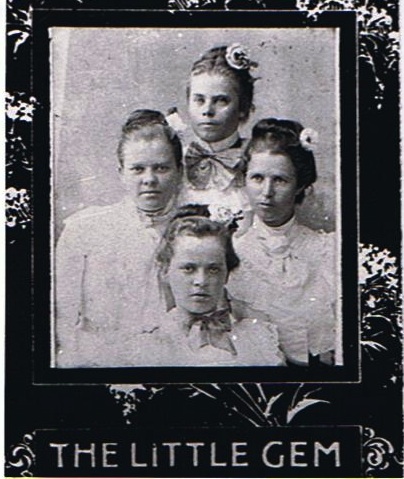 Della and Ida Walker with cousins Alice Evelina Patty and Hettie Melissa Patty.